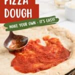 A partially sauced homemade pizza crust with a spoon spreading tomato sauce. Text on image promotes homemade pizza dough and a website link.