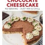 A no-bake chocolate cheesecake topped with whipped cream, mint, and chocolate shavings on a white plate.