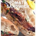 Close-up of a roasted tomato sandwich on ciabatta bread with veggies, text overlay promoting a summer lunch.