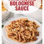 Plate of spaghetti with bolognese sauce and parmesan cheese, labeled Traditional Bolognese Sauce.