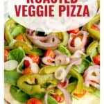 Close-up of roasted veggie pizza topped with greens, peppers, tomatoes, and onions; text overlay reads Roasted Veggie Pizza.