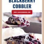 A spoonful of blackberry cobbler held above a plate with cobbler and vanilla ice cream.