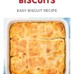 Golden butter swim biscuits in a white baking dish, cut into squares, shown from above.