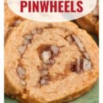 Close-up of cheese pinwheel snacks with pecan pieces, text overlay reads Cheese Pinwheels and website link.
