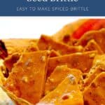 Cinnamon pumpkin seed brittle pieces in a basket.