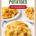 A serving of cheesy funeral potatoes on a white plate with more on plates in the background.
