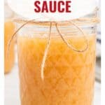 A jar of orange Jezebel sauce tied with twine, labeled with JEZEBEL SAUCE and lanascooking.com.