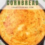 A golden-brown cornbread in a cast iron skillet with text reading Sour Cream & Onion Cornbread.