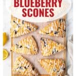 Eight lemon blueberry scones with icing on a board, with text: Lemon Blueberry Scones and website info.