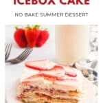 A slice of strawberry icebox cake topped with fresh strawberries on a plate, with strawberries in the background.